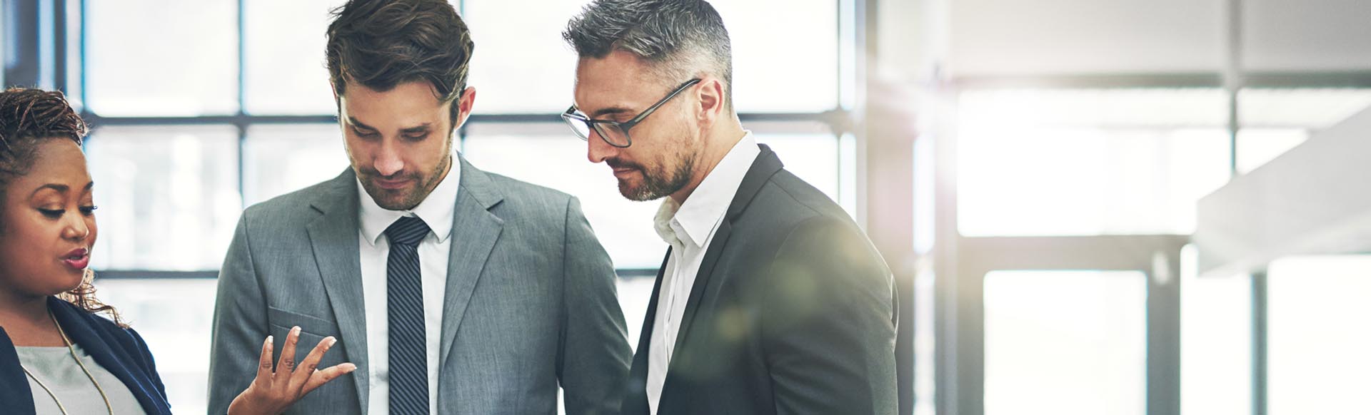 three business people interacting