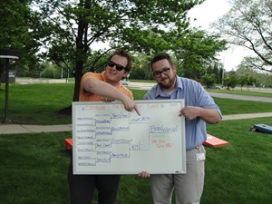 David Bross on the left and Mike Markel are HAPs cornhole champions participating in the Southfield CommUNITY Cup tournament